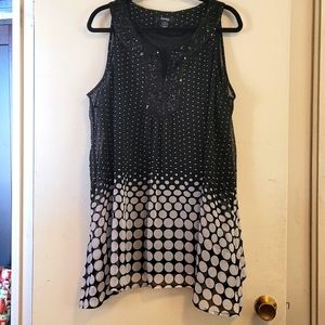 Sleeveless Tunic Top with PolkaDot Print and Sharkbite Hem